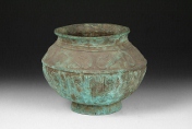 An aged bronze vase