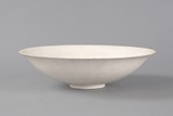 A white glazed porcelain bowl