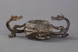 A bronze twin dragon cup