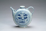 A CHINESE BLUE AND WHITE EWER