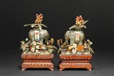 A PAIR OF CLOISONNE ENAMEL ELEPHANTS WITH WALNUT WOOD STAND AND GEM DECORATIONS