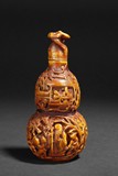 A WOOD CARVED SNUFF BOTTLE 