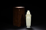 A WHITE JADE VASE AND COVER