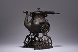 A BRONZE OR SILVER-PLATE 'GOOSE' TEAPOT