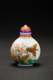 AN ENAMELLED 'FLOWERS AND BIRDS' GLASS SNUFF BOTTLE