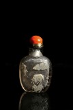 A CRYSTAL CARVED 'THREE RAMS' SNUFF BOTTLE