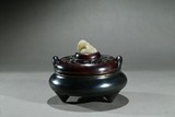 A BRONZE TRIPOD CENSER WITH WHITE JADE LION FINIAL COVER
