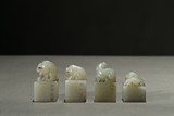 A GROUP OF JADE CARVED MYTHICAL LION SEALS 