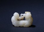 A WHITE JADE 'TWO BOYS' CARVING