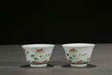 A PAIR OF FAMILLE ROSE 'PEONY' CUPS