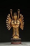 A GILT-LACQUERED WOOD MULTI-ARM GUANYIN