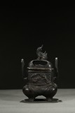 A BRONZE FOUR-FEET CENSER AND COVER