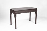 A CHINESE ROSEWOOD 'FLORAL SCROLL' CENTER TABLE 