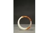 A WHITE AND RUSSET BANGLE