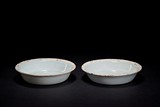 A PAIR OF CELADON GLAZED DISHES