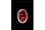 A RED GEM AND DIAMOND GOLD RING