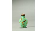 A TURQUOISE-GREEN GLASS GILT SPLASHED SNUFF BOTTLE