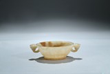 A JADE CARVED 'LOTUS' WASHER