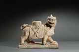 A MARBLE CARVED FIGURE OF LION