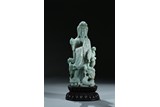 A JADEITE CARVED FIGURE OF GUANYIN AND DRAGON