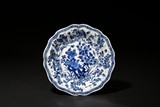 A BLUE AND WHITE 'FLOWERS AND BUTTERFLY' DISH