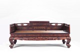 A LARGE LACQUERED WOOD LUOHAN BED