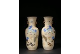 A PAIR OF CRACKLED MOULDED 'MYTHICAL BEAST' VASES