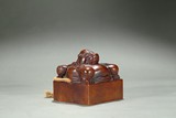 A LARGE IMPERIAL SANDALWOOD 'MYTHICAL BEAST' SEAL