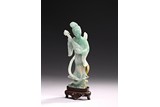 A JADEITE CARVED FIGURE OF GUANYIN WITH INSTRUMENT