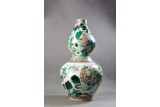 A FAMILLE VERTE 'EIGHT IMMORTALS' DOUBLE GOURD VASE