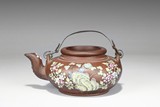 A PAINTED 'PLUM BLOSSOM' YIXING TEAPOT