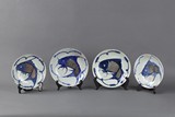 A SET OF FOUR BLUE AND WHITE 'CARP' DISHES