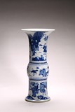 A CHINESE BLUE AND WHITE 'FIGURES' GU VASE