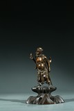 A CHINESE PARCEL-GILT BRONZE FIGURE OF TIE GUAILI