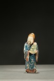 A PAINTED SOAPSTONE CARVING OF LU STAR