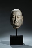 A LIMESTONE CARVED HEAD OF LUOHAN