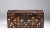A CHINESE RED LACQUER GILT PAINTED TRUNK