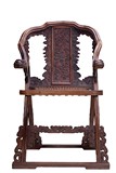 A HUANGHUALI CARVED FOLDING CHAIR