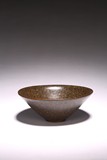 A CHINESE BROWN GLAZED CONIVAL BOWL