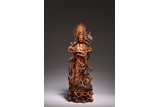 A CHINESE BOXWOOD CARVED GUANYIN FIGURE
