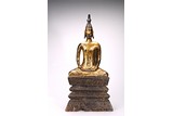 A GILT LACQUER WOOD CARVED BUDDHA