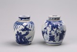 A PAIR OF BLUE AND WHITE JARS AND COVERS