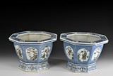 A PAIR OF BLUE AND WHITE FAMILLE ROSE PLANTERS