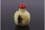 A CHINESE SUZHOU WHITE AND RUSSET JADE SNUFF BOTTLE