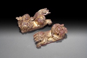 A pair of wooden Qilin figures