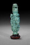 A Chinese carved turquoise lidded bottle