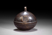 A Chinese bronze shell bell