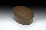 A Chinese bronze ink round box