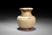 A Chinese light brown partially glazed vase