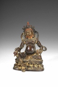 A Tibetan gilt bronze figure